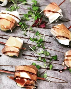 Prosciutto wrapped blue cheese stuffed figs for the optimum salty and sweet.